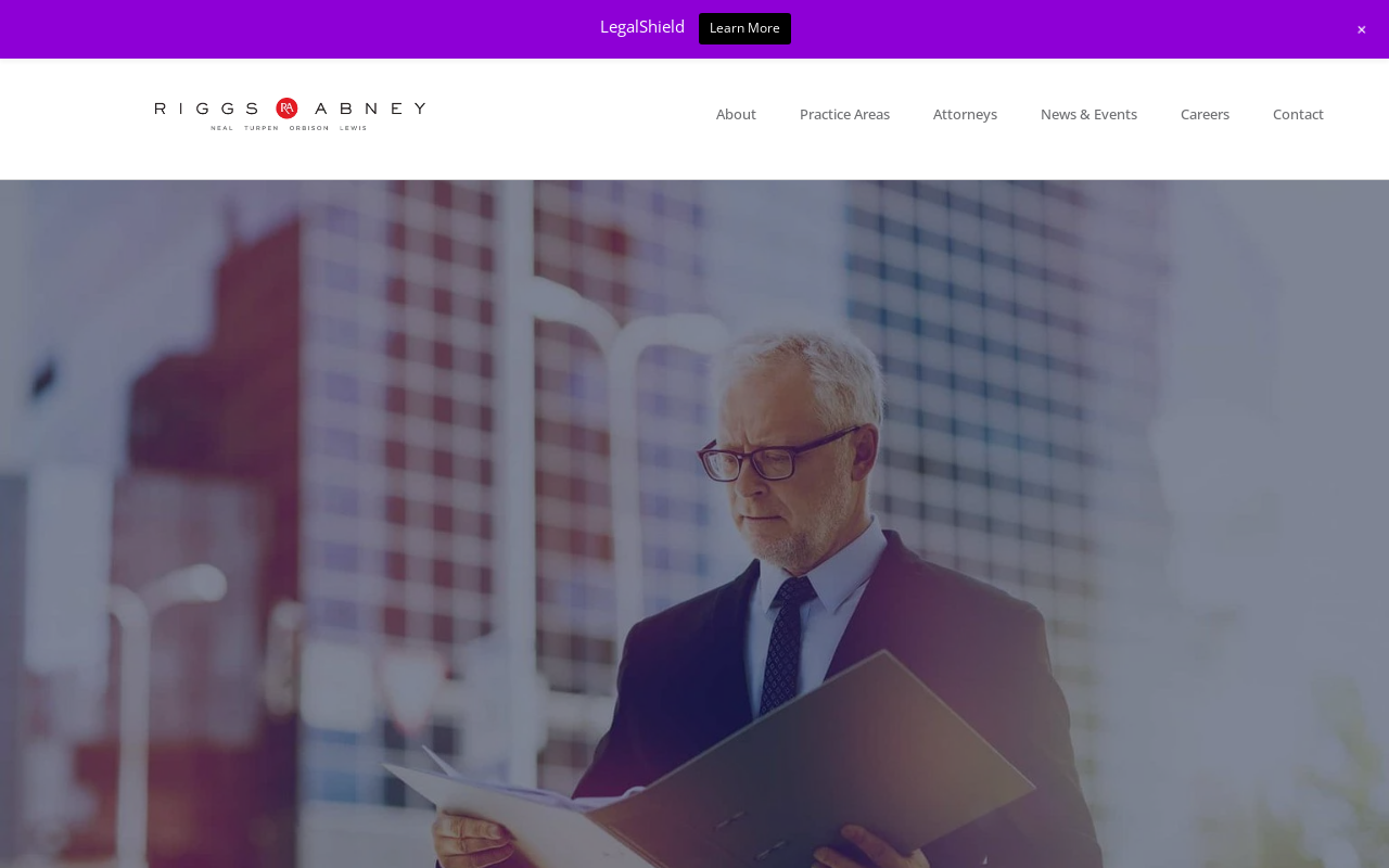 Riggs Abney Law Firm — screenshot of their official website